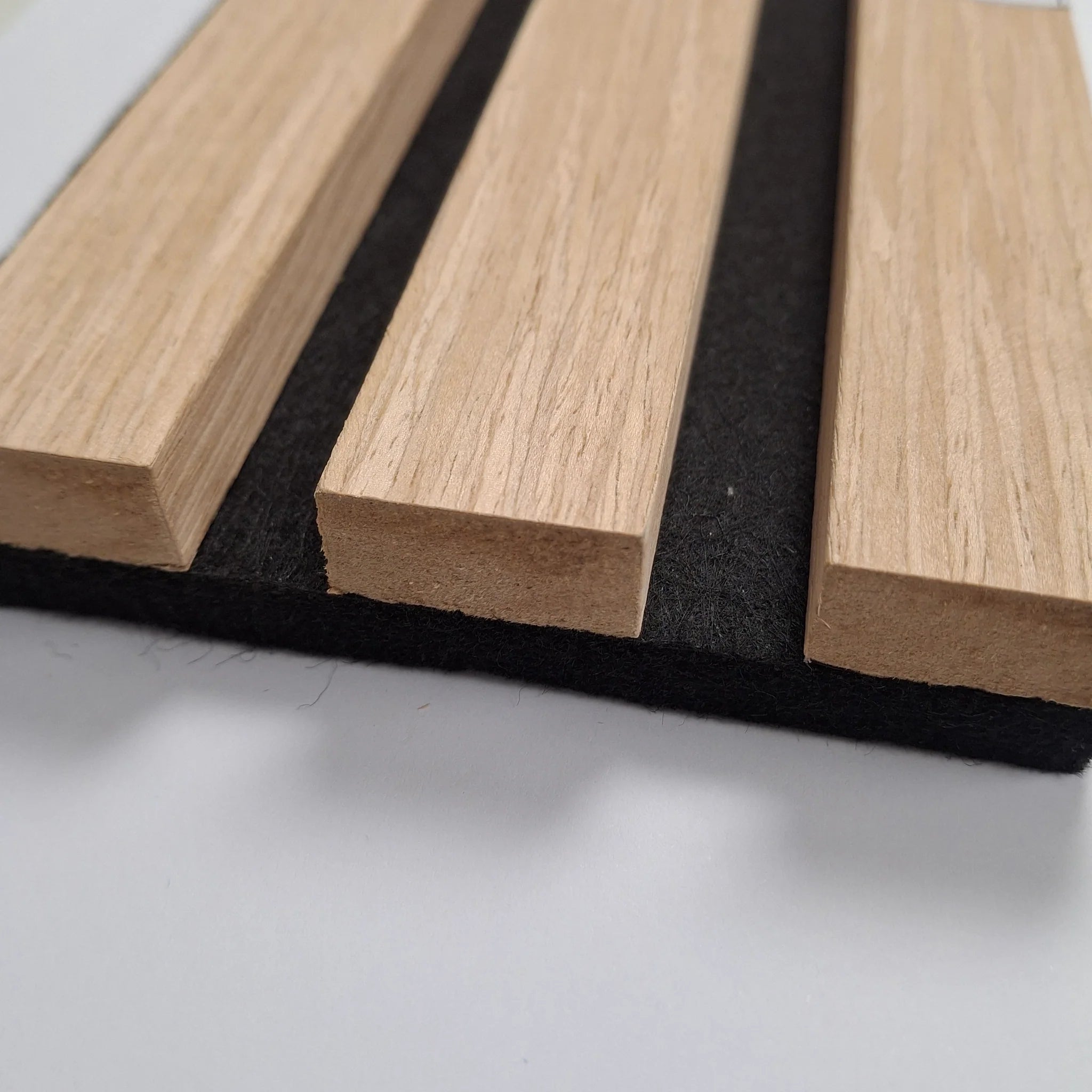Premium oak acoustic slatted wall panel with 3-sided real wood veneer Solid Furniture UK