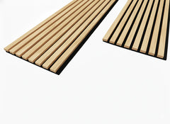 Close-up of Premium Oak acoustic wall panel showing real wood veneer wrapped on three sides with smooth, high-quality finish. solid furniture UK