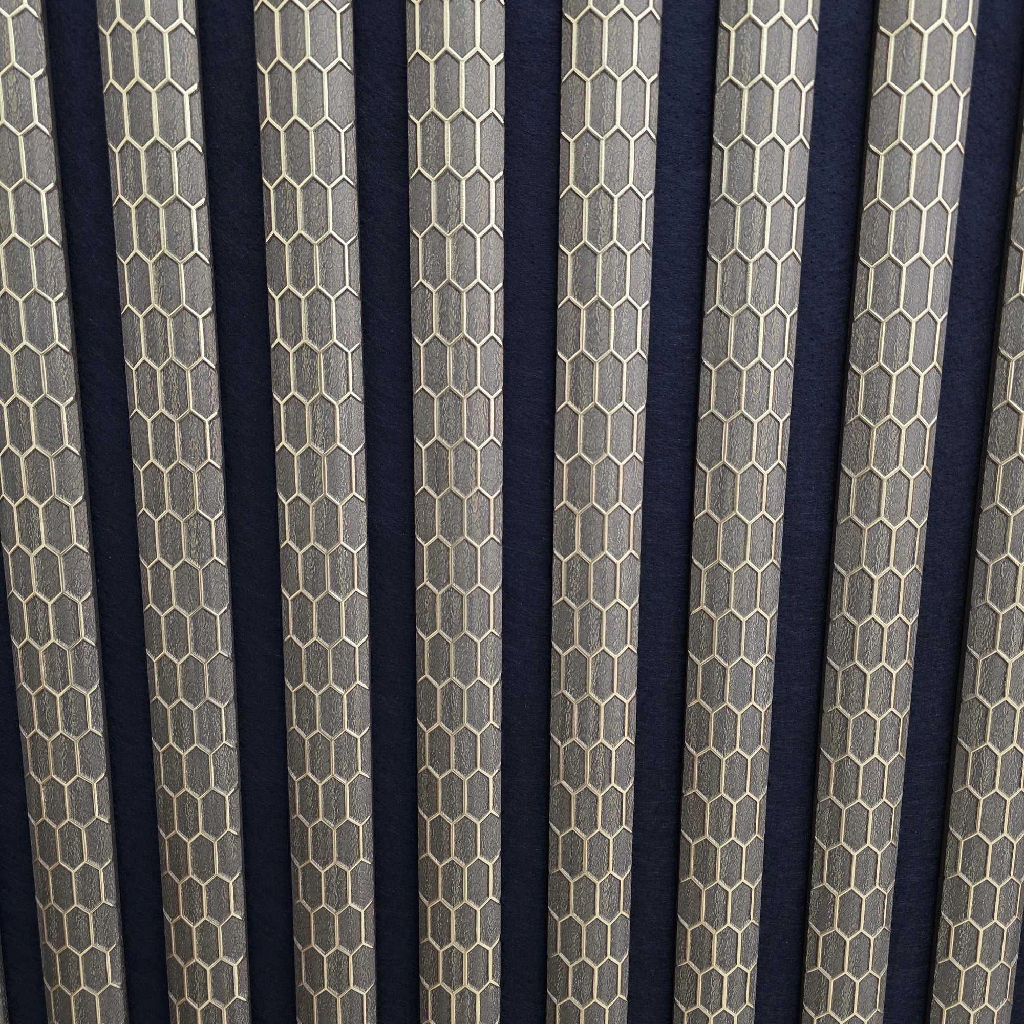 Premium quartz print brown acoustic wall panel 60x240cm with 3D gold line detail and slatted design main product view. solid furniture UK
