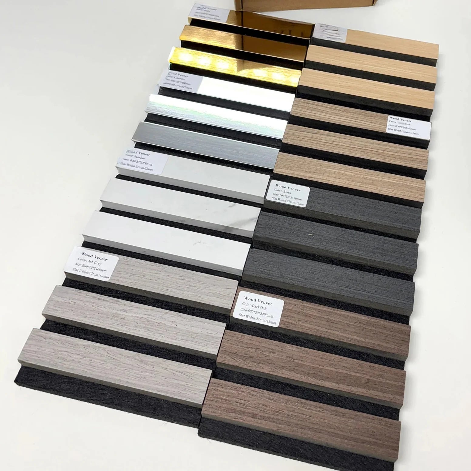 Wall panel samples of Real Wood Charcoal acoustic slatted panels by Solid Furniture UK showing wood finish options and texture comparison