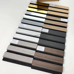 Wall panel samples of Real Wood Charcoal acoustic slatted panels by Solid Furniture UK showing wood finish options and texture comparison