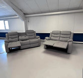 Roma light grey air leather recliner sofa in main view with modern design and dual reclining seats solid furniture UK