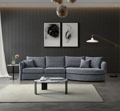Front view of Rubin corner chaise sofa in charcoal bouclé fabric with curved design solid furniture UK