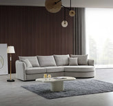 Front view of Rubin corner chaise sofa in pebble grey bouclé fabric with curved modern design solid furniture UK