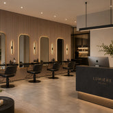 Premium oak slatted acoustic wall panels installed in a modern beauty parlour interior by solid furniture UK