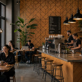 Shard Acoustic Wall Panels by Solid Furniture UK installed in a restaurant interior, pack of 4 self adhesive panels creating a modern wood effect feature wall with acoustic sound reduction for UK dining spaces