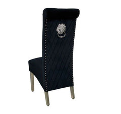 Sofia black velvet dining chair back view showing lion head detail and chrome legs by Solid Furniture UK