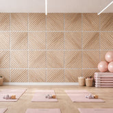 Square horizontal and diagonal oak acoustic wall panels by Solid Furniture installed on a modern UK interior feature wall with grey felt backing.