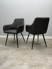 Back view of dining chair set of 2 from Solid Furniture UK featuring grey leather-look upholstery and metal frame construction