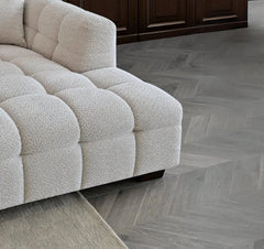 Angled corner view of Tribeca RHF corner sofa in oatmeal bouclé highlighting spacious seating - SOLID FURNITURE LTD