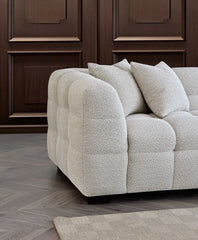 Side corner view of Tribeca Sofa Range in oatmeal boucle fabric solid furniture UK