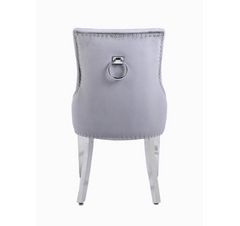 Back view of Valencia light grey PU leather dining chair with chrome legs and elegant ring knocker design UK furniture from Solid Furniture UK