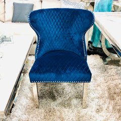 Solid Furniture UK navy Valentino velvet dining chair with chrome legs and lion knocker – main view