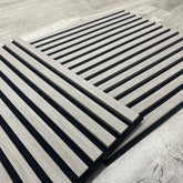 3D decorative angled view of a square ash grey acoustic wall panel by Solid Furniture LTD highlighting slat detail, premium finish, and acoustic performance.