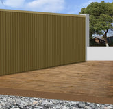 Khaki outdoor wall panels installed in a modern exterior space, featuring 290cm composite cladding that creates a tall, seamless, and stylish finish for garden or patio walls. solid furniture UK
