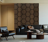 Walnut hexagon acoustic wall panels installed in modern living room feature wall. solid furniture UK