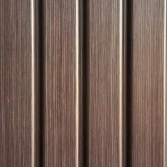 Close-up view of walnut seamless wall panels UK by Solid Furniture LTD highlighting detailed wood grain texture and smooth finish