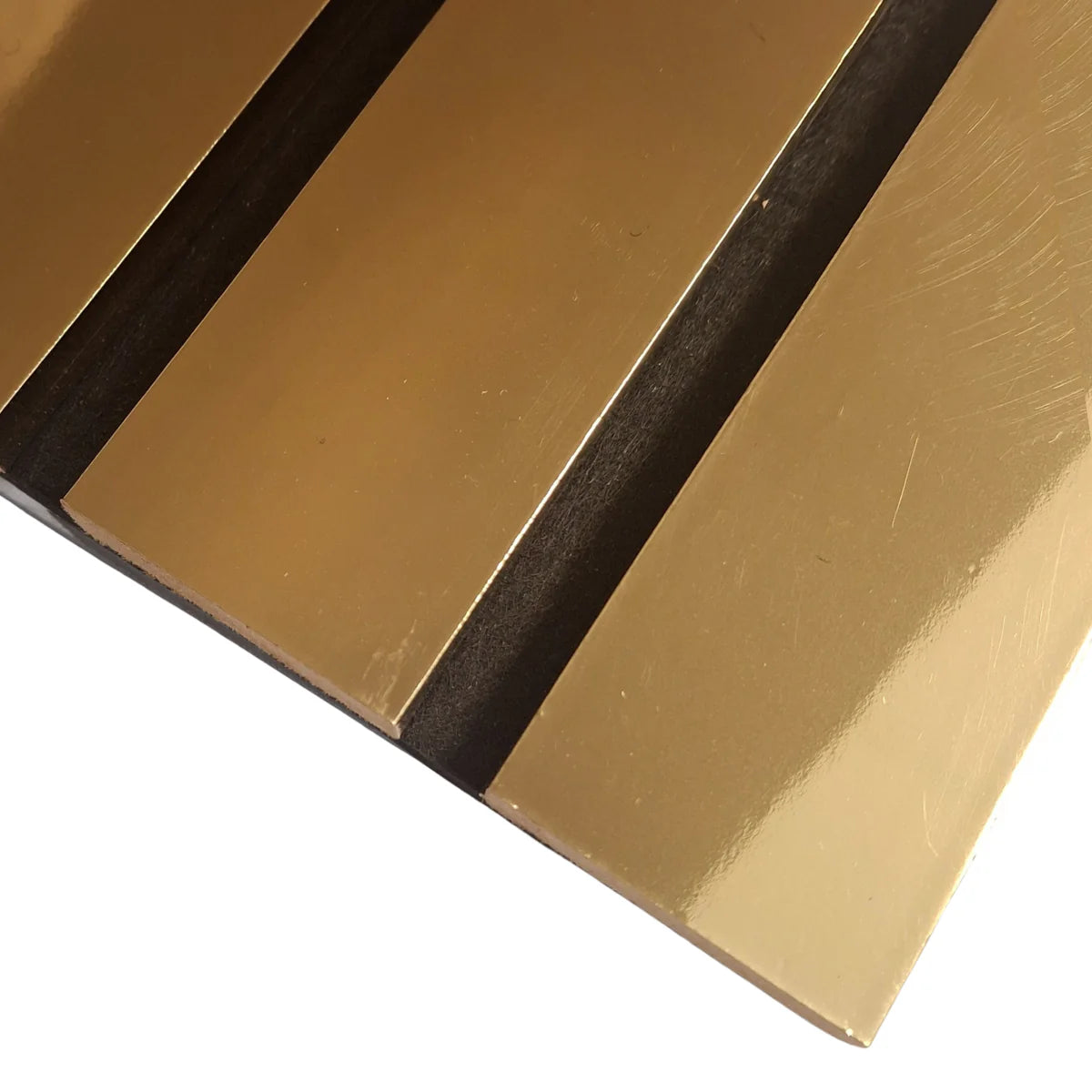 Close-up of wide slat 3-sided gold-colored wall panel showing textured finish, vibrant gold tone, and acoustic felt backing for a luxurious, modern look solid furniture UK.