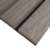 Close-up of wide slat 3-sided wood veneer acoustic wall panel in premium grey oak showing rich texture, smooth finish, and modern slat detail solid furniture UK