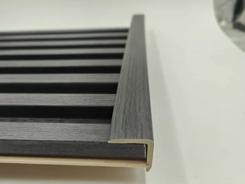 Installed dark grey wall panel end trim UK by Solid Furniture UK providing a clean, professional and seamless finish to modern interior wall panels.