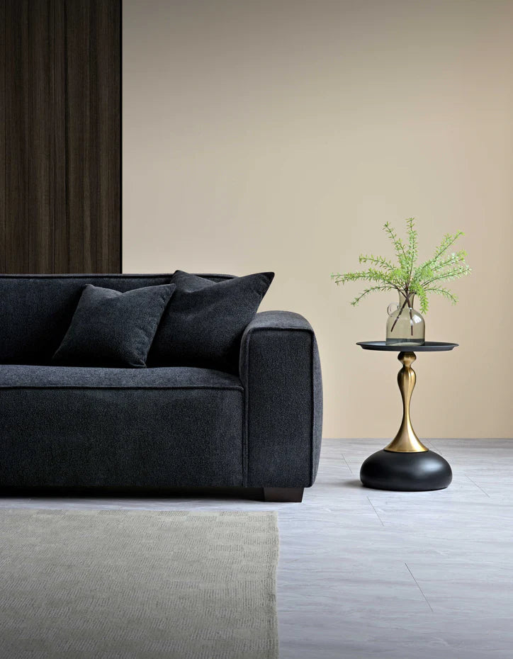 Corner view of Dakota luxury bouclé 4 seater sofa with chaise and soft textured fabric upholstery
