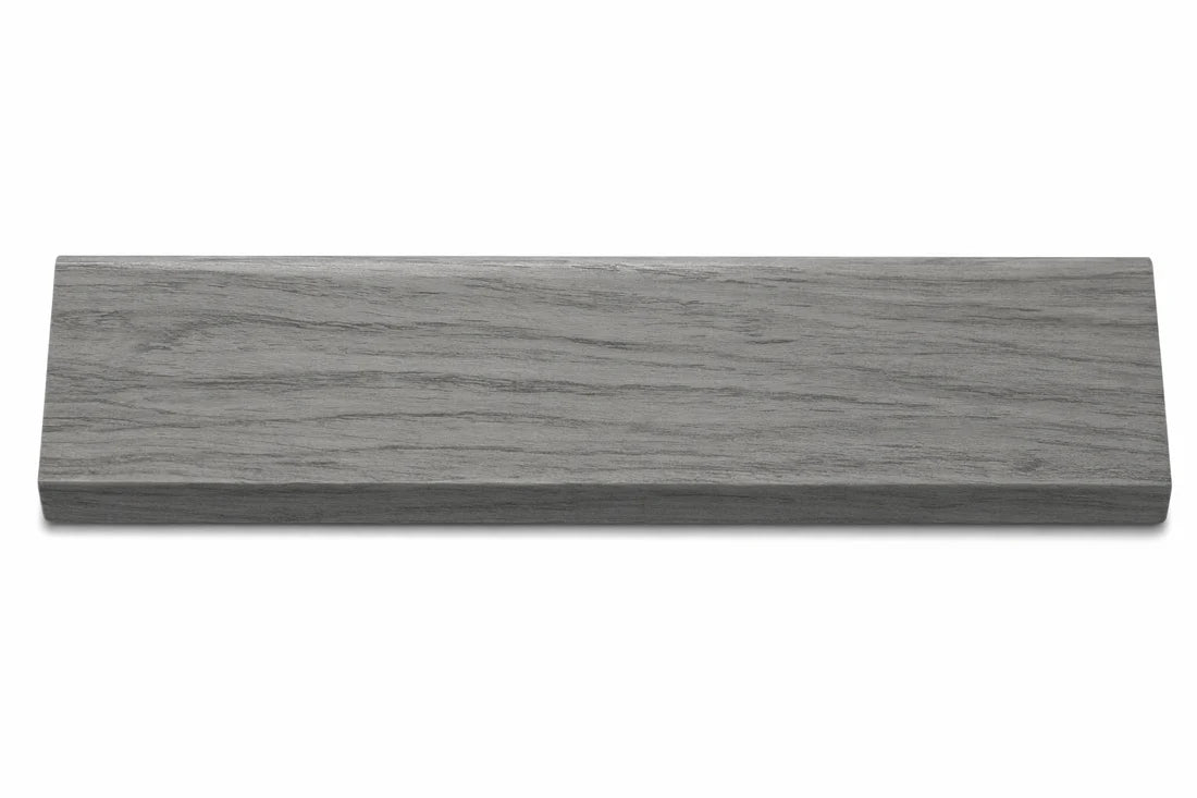 Side View: Grey acoustic blocks wall panel end trim displayed from the side to show profile shape and precise fit for installation. solid furniture UK