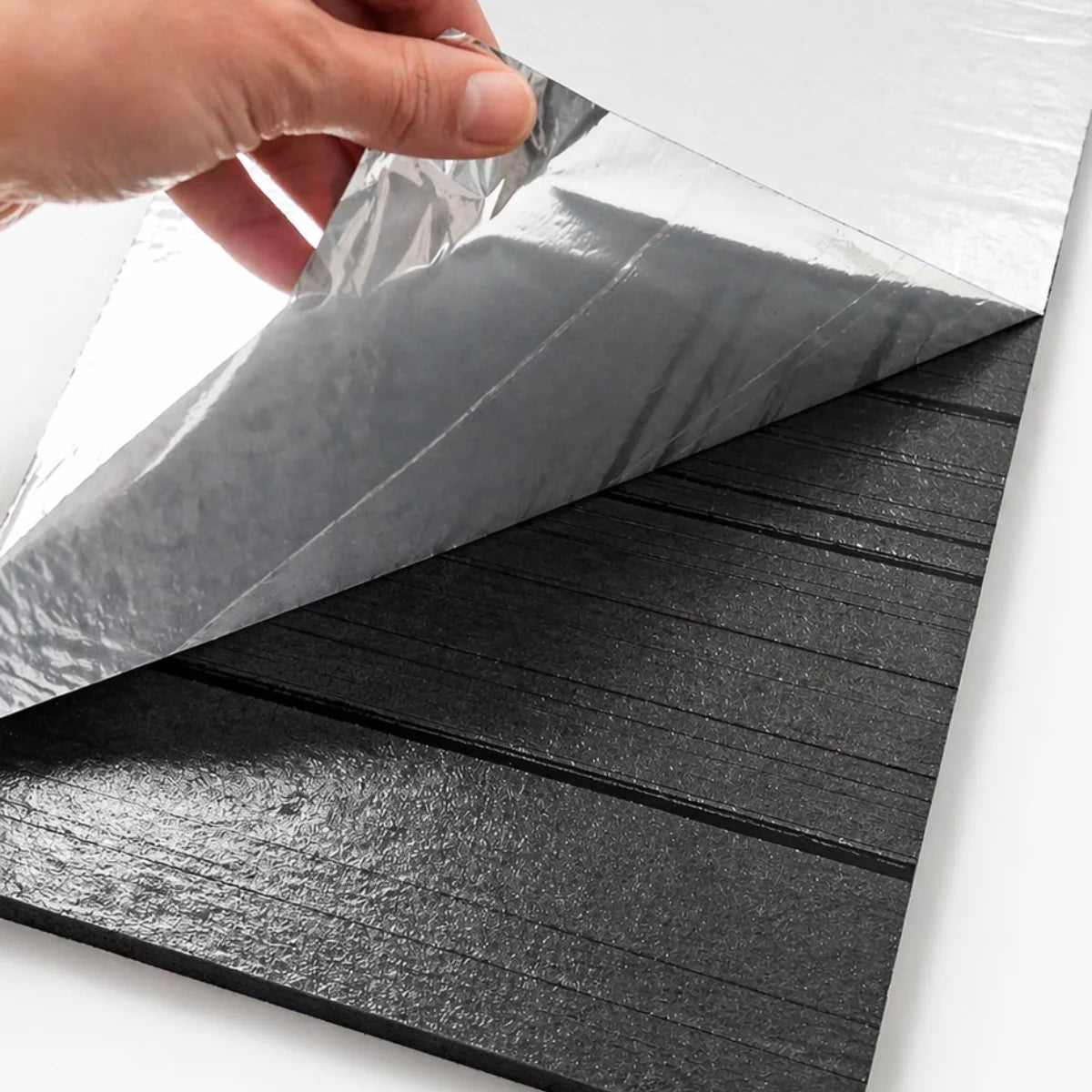 Peel and stick backing detail of acoustic self adhesive lattice wall panels pack of 4 from Solid Furniture UK showing easy DIY installation system with strong adhesive layer for quick wall application
