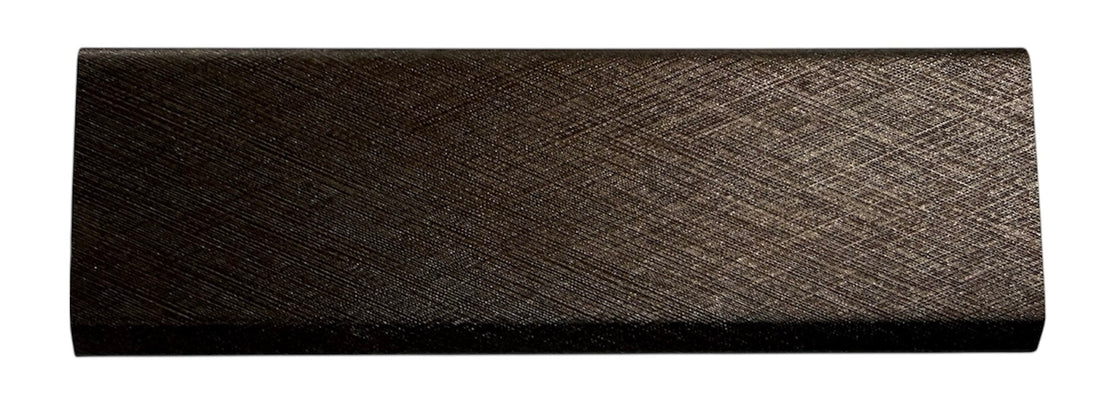 Side view of metallic brown acoustic slatted wall panel end trim showing profile and edge detail solid furniture UK
