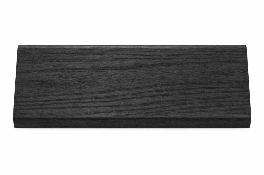 Side view of black acoustic wall panel end trim showing profile and edge detail solid furniture UK