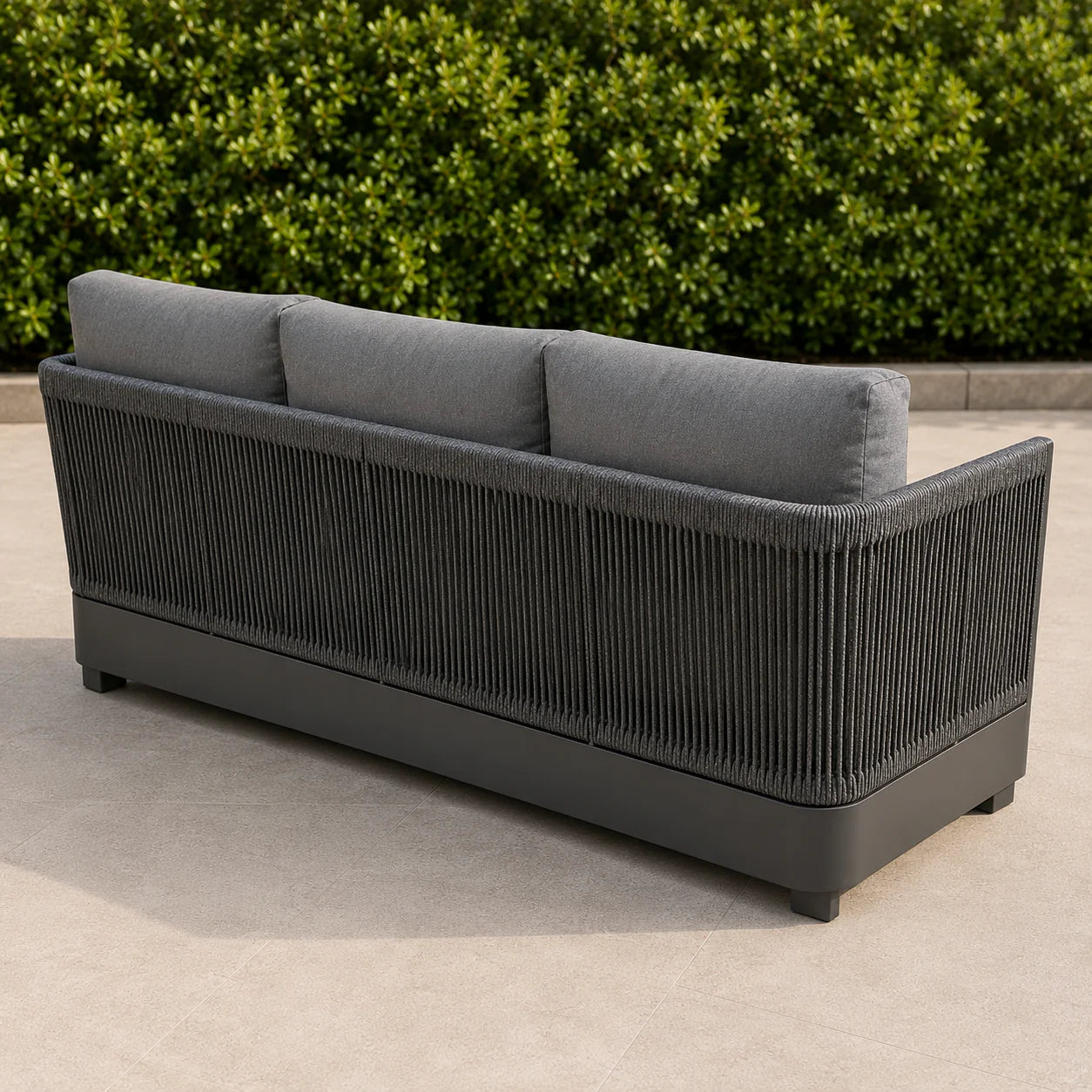 Back view of Ares Onyx 3 seater outdoor garden sofa with powder-coated aluminium frame and modern onyx finish in luxury patio setting solid furniture UK