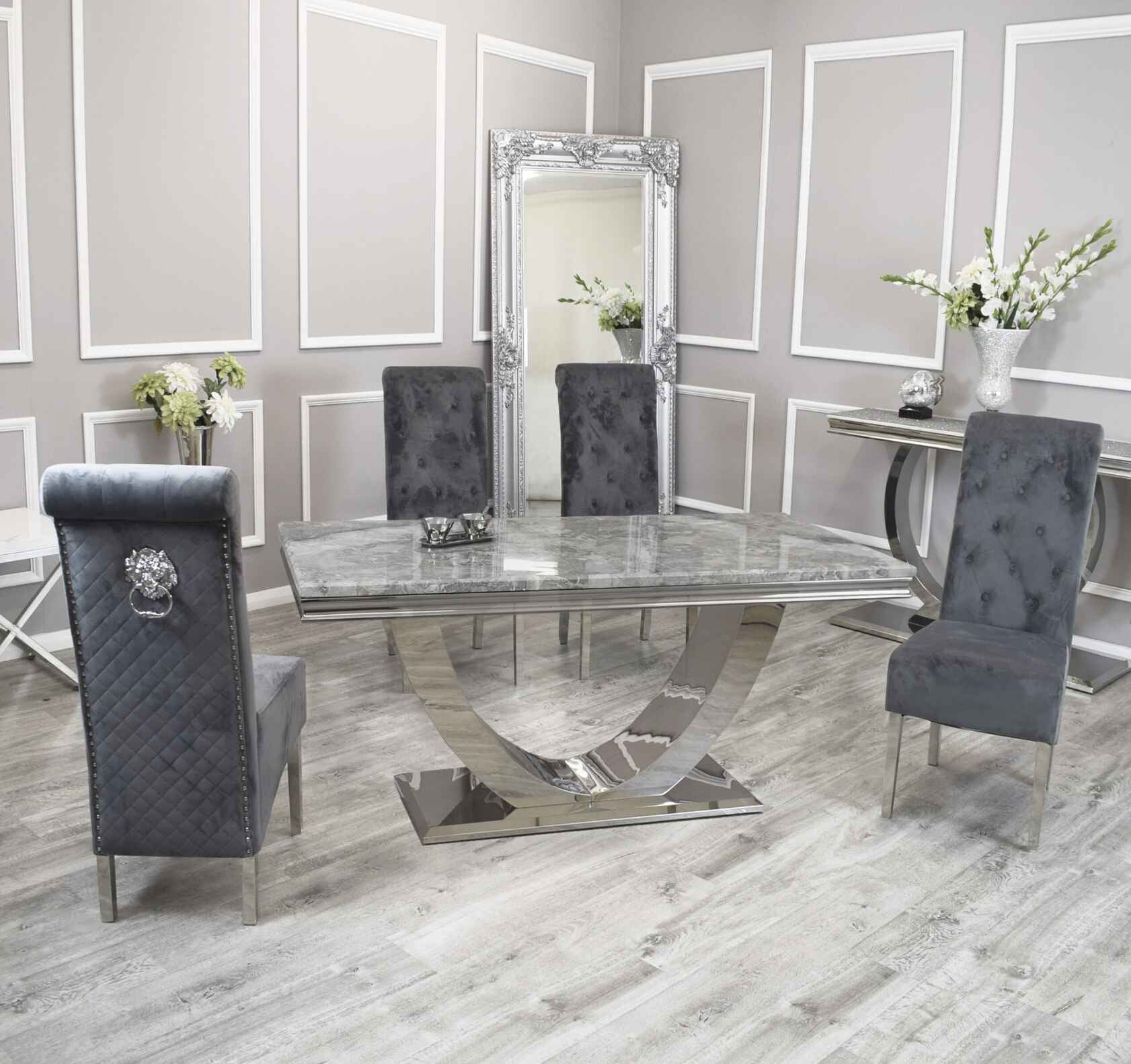 Arial chrome marble effect dining table with Sofia dark grey velvet chairs, main front view showing full dining set with chrome pedestal base and luxury velvet seating. solid furniture uk