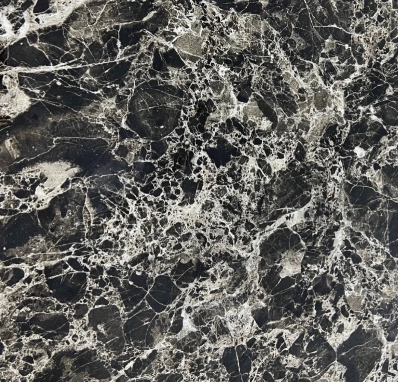 Arial dining table with black marble top and gold base | Solid Furniture UK