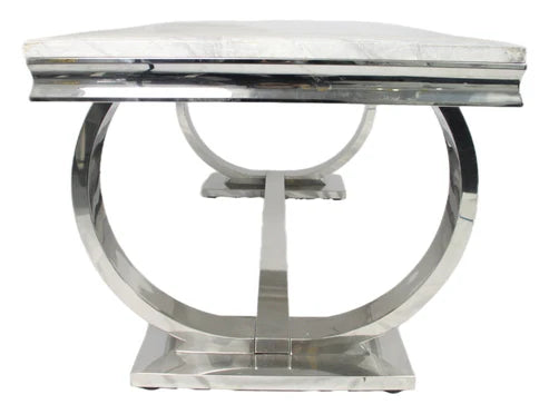 Close-up detail of Arriana dining table chrome base frame showing circular legs and central support bar – Solid Furniture UK
