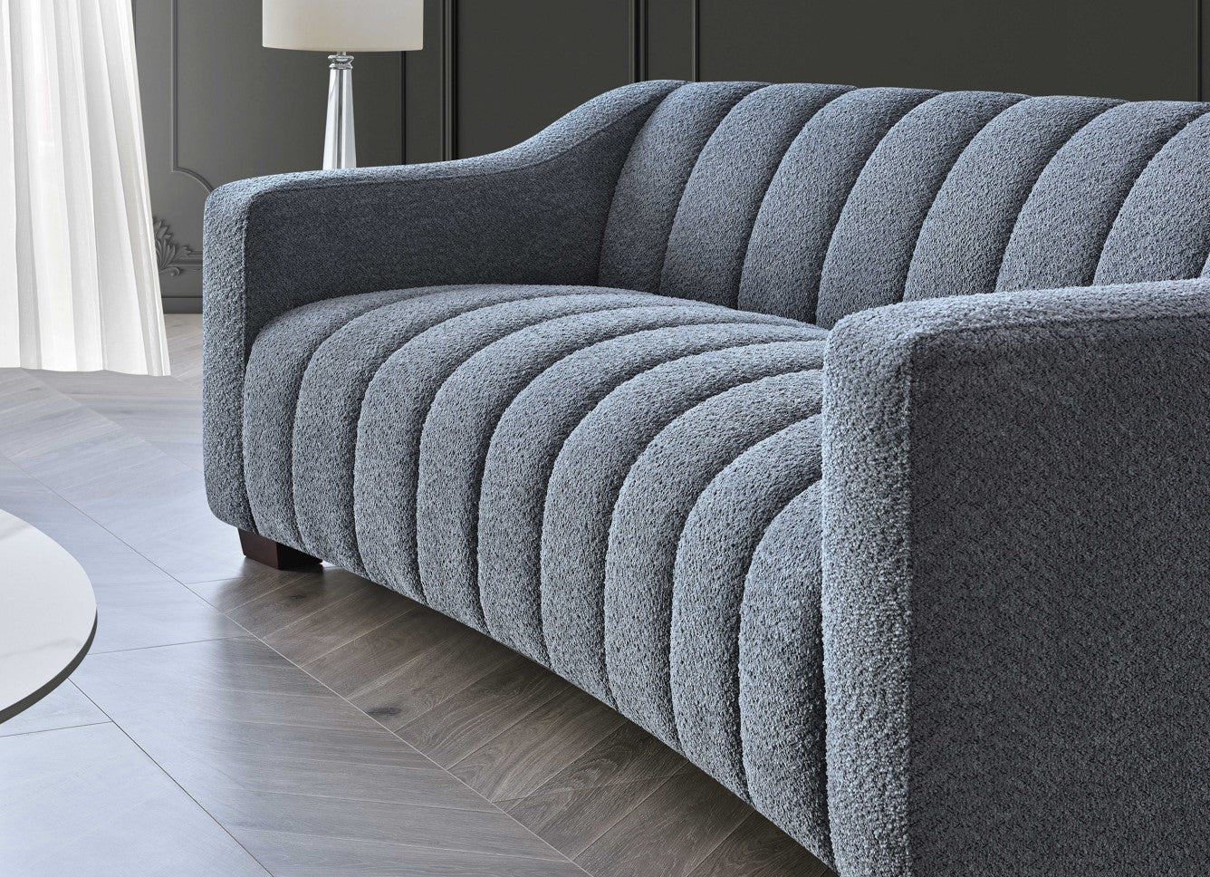 Side view of Astoria 3 seater sofa in iron bouclé fabric showing modern design and arm detail UK solid furniture UK