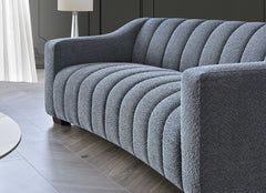 Side view of Astoria 3 seater sofa in iron bouclé fabric showing modern design and arm detail UK solid furniture UK