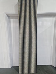 Beige and gold vein acoustic wall panel installed on a modern living room wall, reducing echo and adding luxury style. solid furniture uk