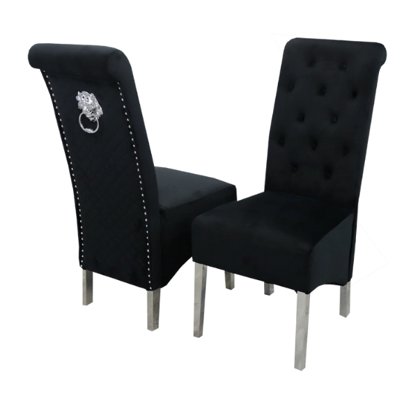 Black Emma velvet dining chair UK main view with luxury scroll-back design, button detailing, chrome lion knocker, and chrome legs from Solid Furniture UK.