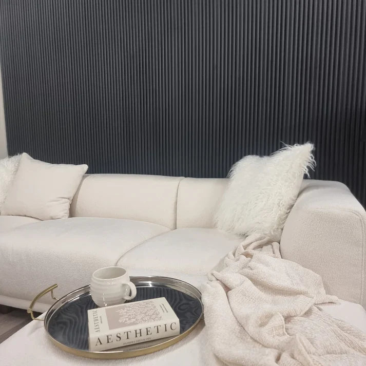 Black fluted wall panels installed in a drawing room by Solid Furniture UK creating an elegant and contemporary living space