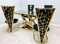 Side view of black and gold marble dining table with gold base and dining chairs modern luxury furniture UK by Solid Furniture UK