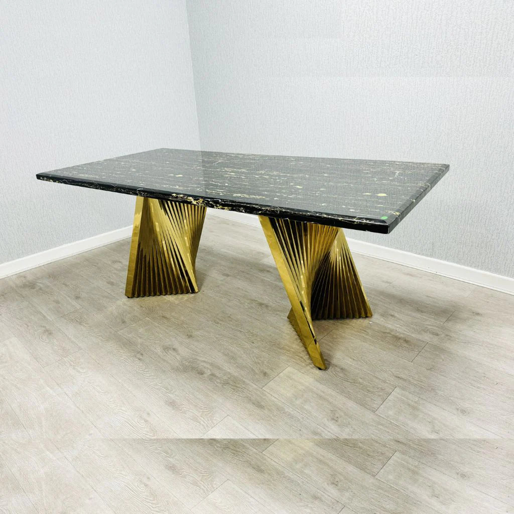 Black and gold Ravello 160cm dining table featuring a marble-effect glossy top with a gold pedestal base, designed for modern and luxury dining interiors. solid furniture UK