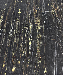 Black and gold Ravello 160cm marble-effect table top with glossy finish and gold pedestal base, designed for modern luxury dining spaces. solid furniture UK