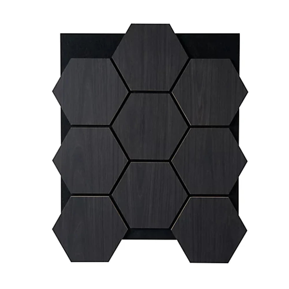 Black Oak Hexagon Acoustic Wall Panels installed in a modern living room. solid furniture UK
