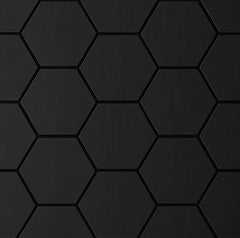 Close-up of Black Oak hexagon acoustic wall panels showing geometric pattern, textured finish, and felted backing for enhanced sound absorption. solid furniture UK