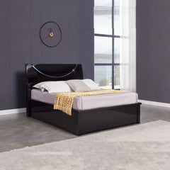 Black ottoman storage bed frame with modern headboard by Solid Furniture UK