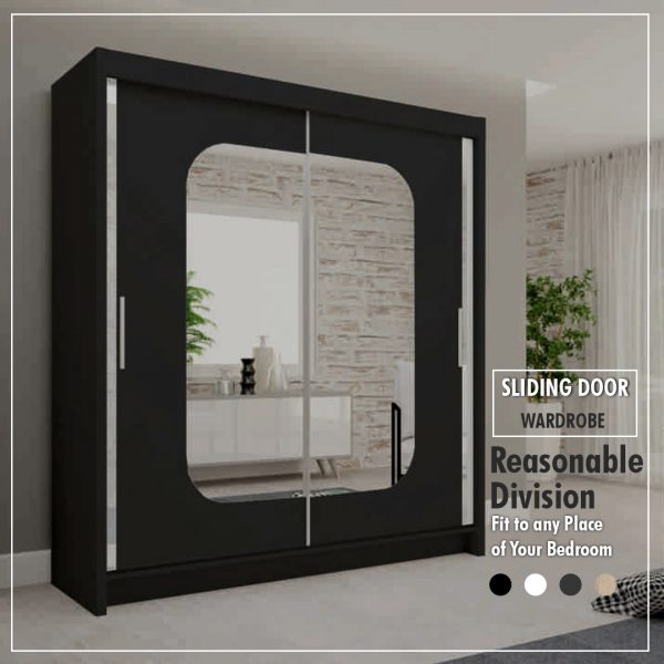 Black sliding wardrobe with mirrored doors styled in a contemporary bedroom