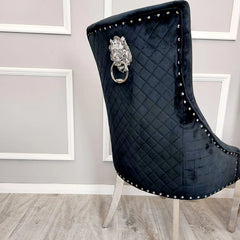 Black velvet Bentley dining chair UK back view by Solid Furniture UK showing high backrest, quilted stitching, and chrome frame design