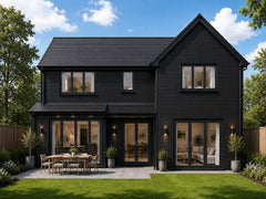 Black waterproof outdoor cladding panels installed on a house exterior by Solid Furniture UK