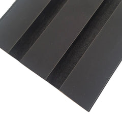 Close-up of 3-sided black acoustic slat panel (slat size 32 x 240mm) showing smooth finished edges, even color, and built-in felt backing for sound absorption. solid furniture UK