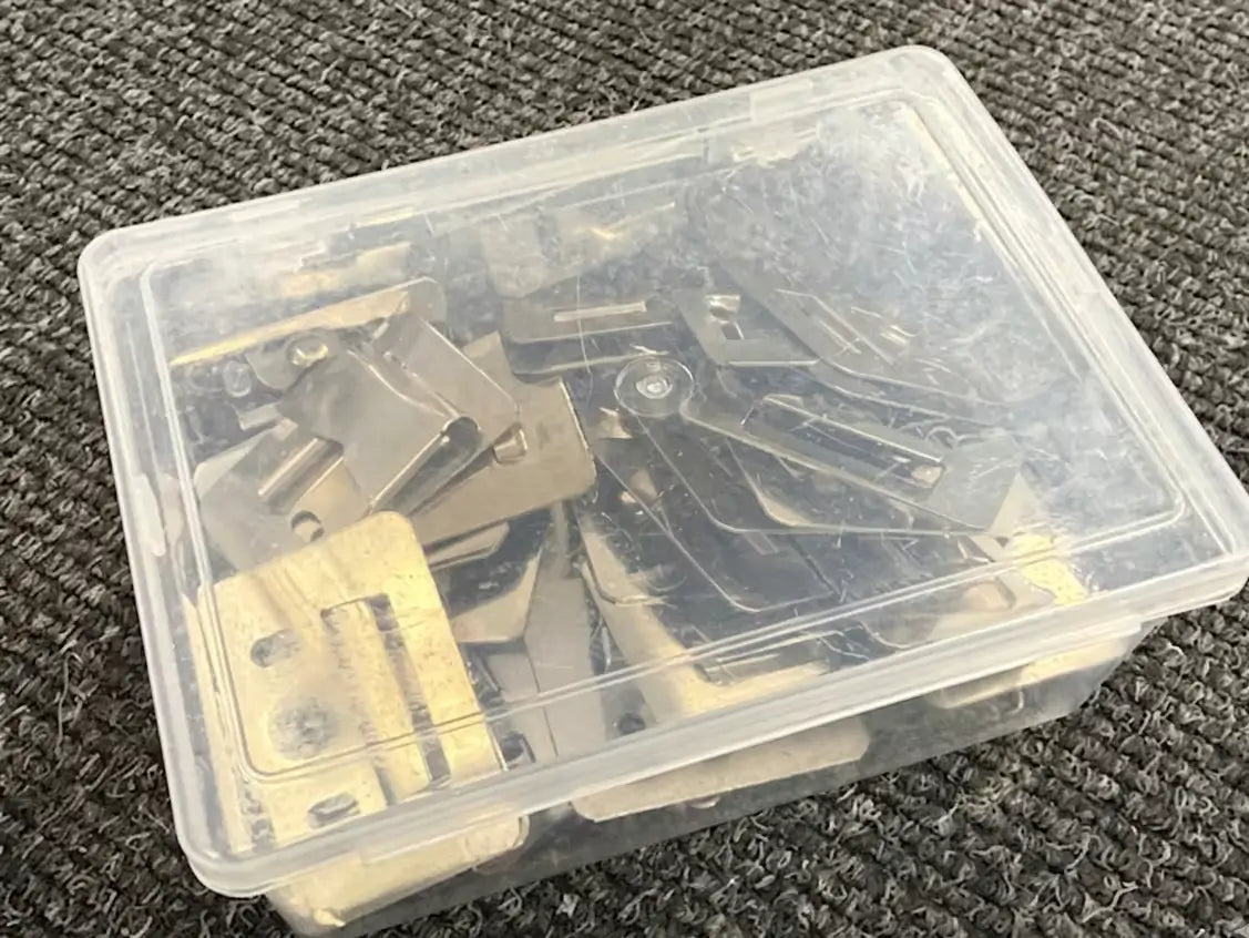 Box of 50 heavy duty brackets for outdoor wall panels showing bulk packaging for installation projects