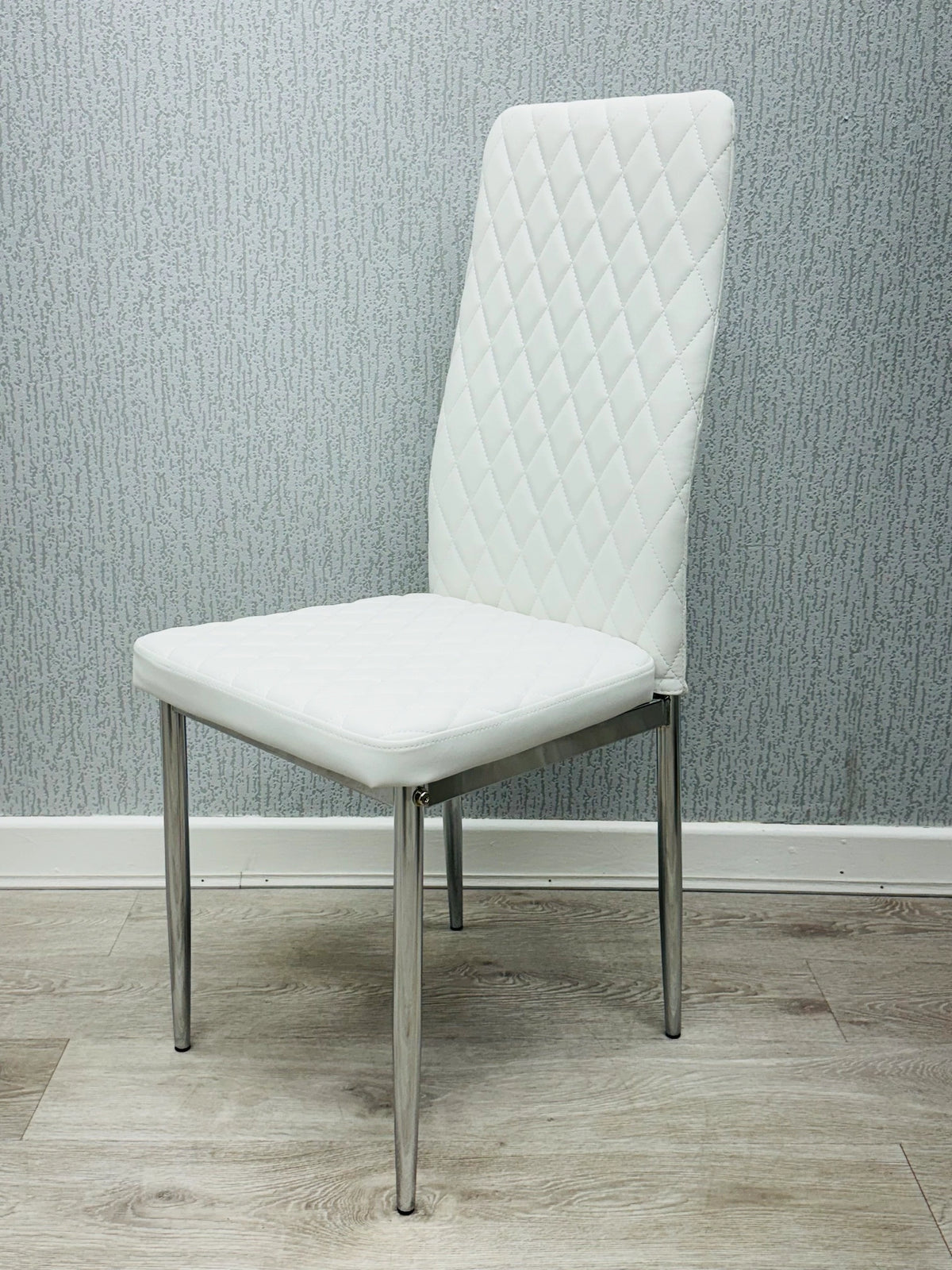 White California PU Dining Chair front view in faux leather with chrome legs by Solid Furniture UK